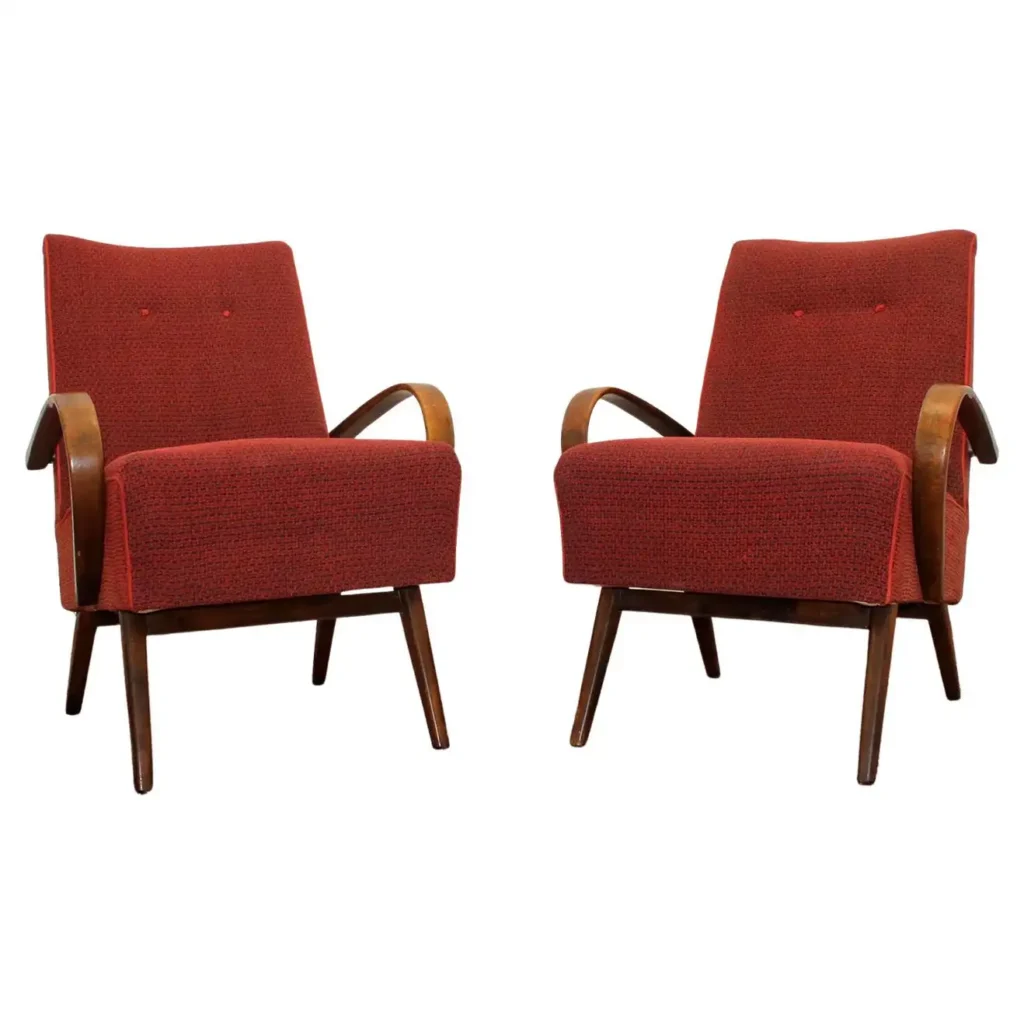 A pair of your20th midcentury bentwood armchairs by Jaroslav Šmídek, 1960´ sitting next to each other.